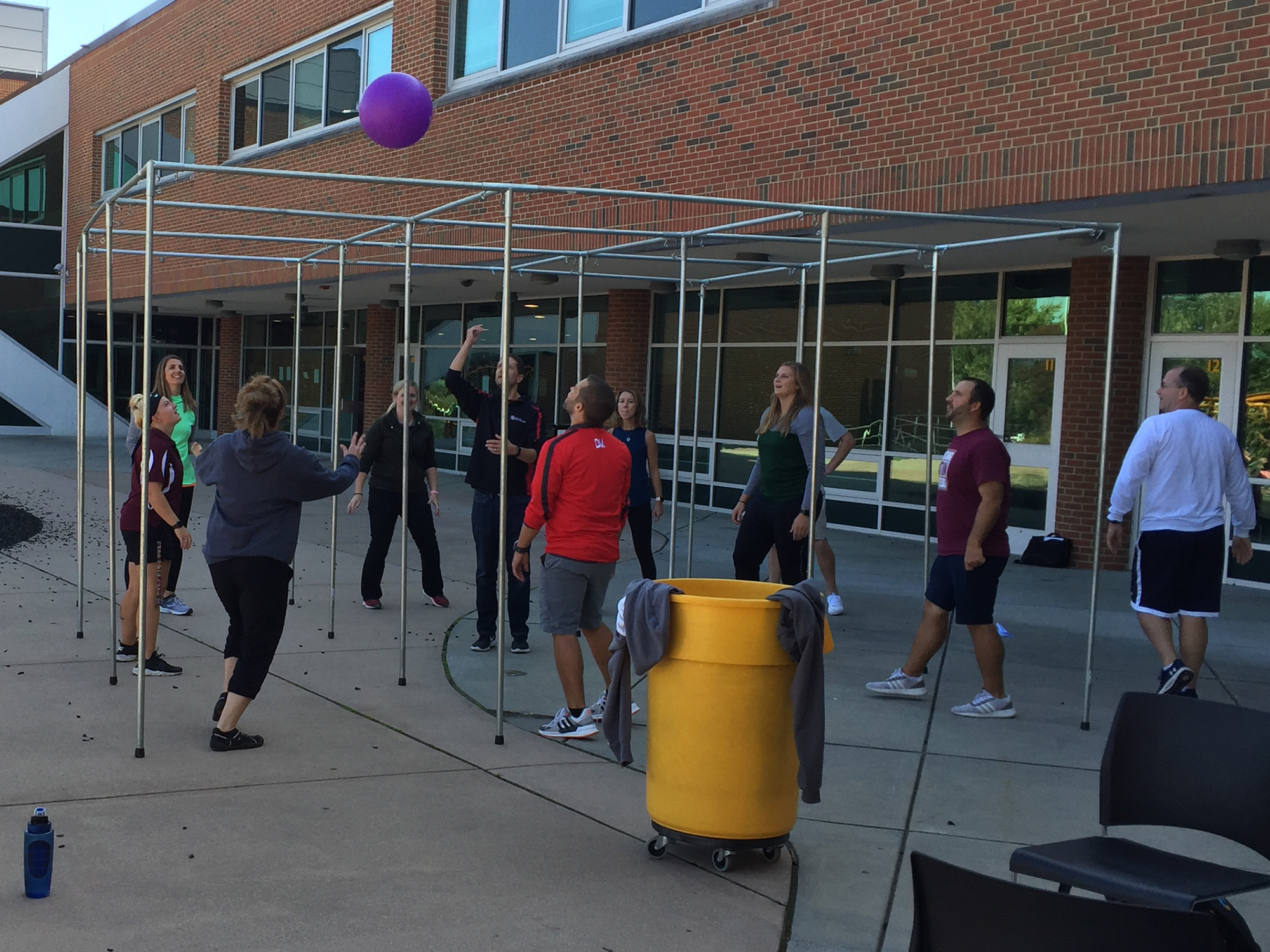 Physical Education teachers playing a game of nine square at Common Inservice Day