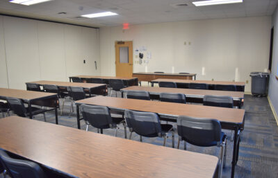 A view of Commonwealth B Meeting Room set up classroom style from the back of the room